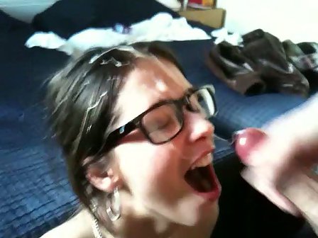 Cum on face after blowjob from brunette in glasses